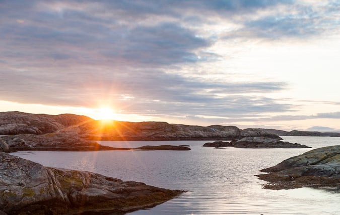 Paddlare i soluppgång